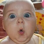 baby-big-eyes-grimacing