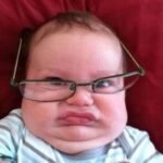 child-with-glasses-grimacing