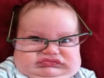 child-with-glasses-grimacing